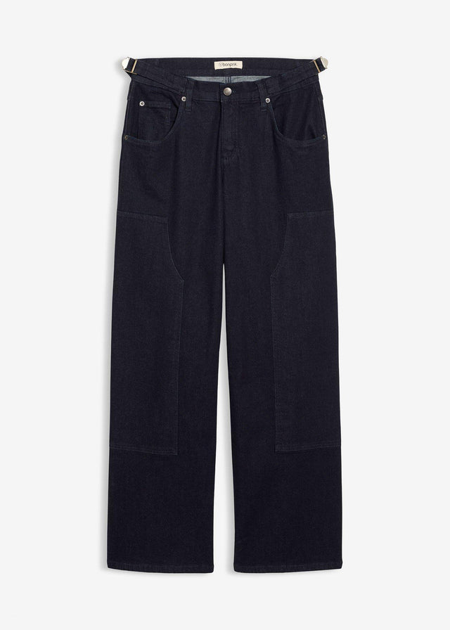 Kavbojke s širokimi hlačnicami in srednje visokim pasom