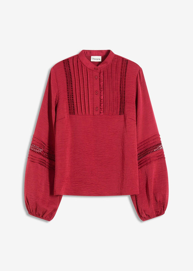 Ohlapna bluza z okraskom