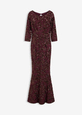 Obleka z bleščicami z izrezom zadaj